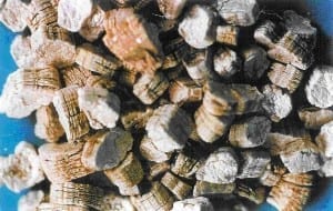 Vermiculite, a naturally occurring mineral, contains Asbestos