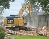 demolition lacking an asbestos abatement contractor