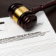 Bankruptcy petition for non-individuals with a judge's gavel, representing Georgia-Pacific's asbestos bankruptcy filing